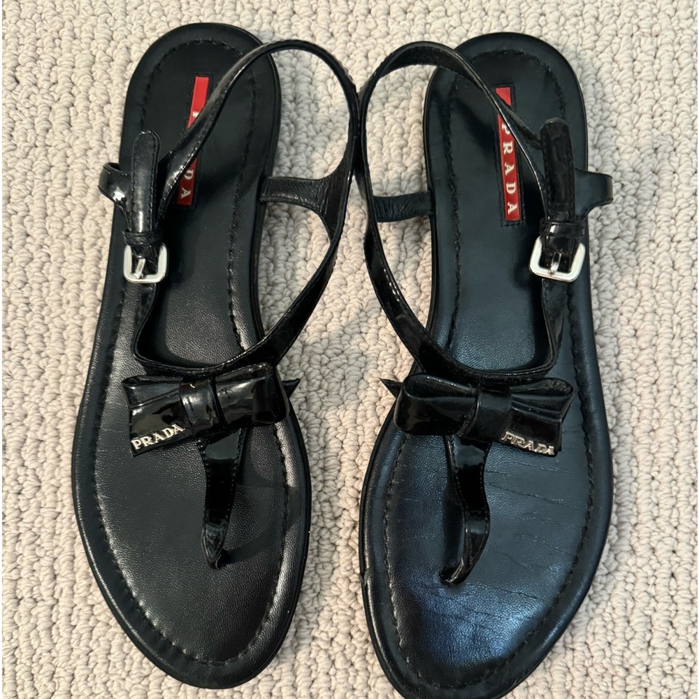 PRADA Women’s Black patent sandal with bow . Sz 39